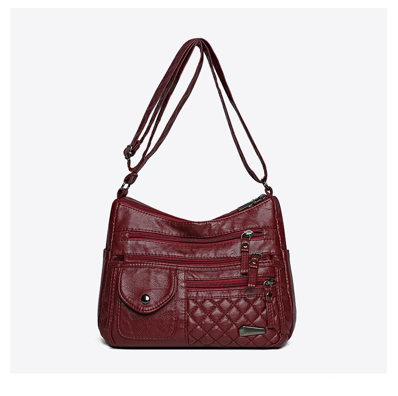 🔥【50% de descuento】Bolso de cuero suave de gran capacidad y múltiples capas para mujer