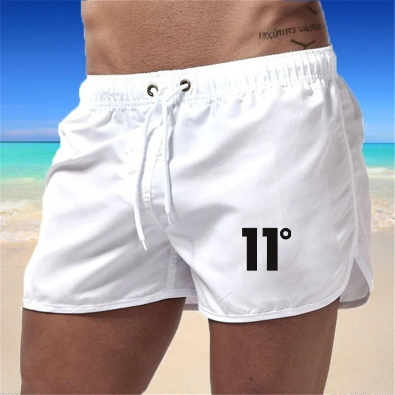🏖️👖Módní pánské plavecké šortky s vícebarevným potiskem 2026