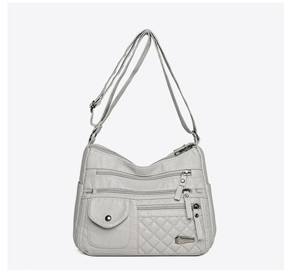 🔥【50% de descuento】Bolso de cuero suave de gran capacidad y múltiples capas para mujer