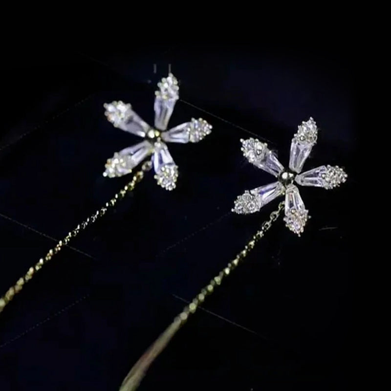 【Compra 1 y llévate 1 gratis】Elegantes pendientes colgantes con borlas a la moda