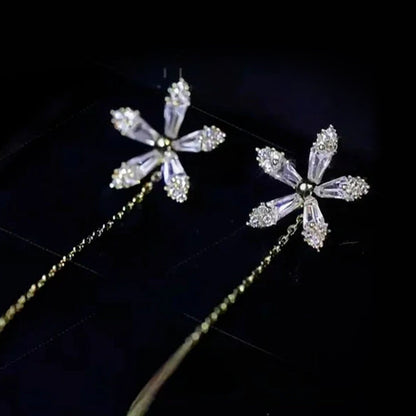 【Compra 1 y llévate 1 gratis】Elegantes pendientes colgantes con borlas a la moda