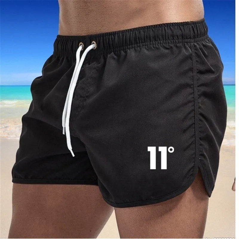 🏖️👖Módní pánské plavecké šortky s vícebarevným potiskem 2026