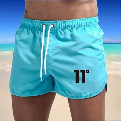 🏖️👖Módní pánské plavecké šortky s vícebarevným potiskem 2026
