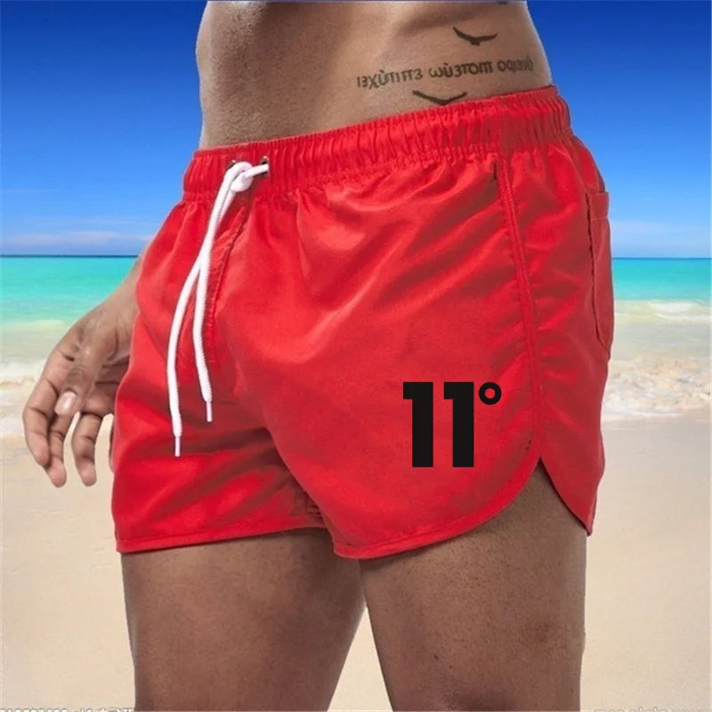 🏖️👖Módní pánské plavecké šortky s vícebarevným potiskem 2026