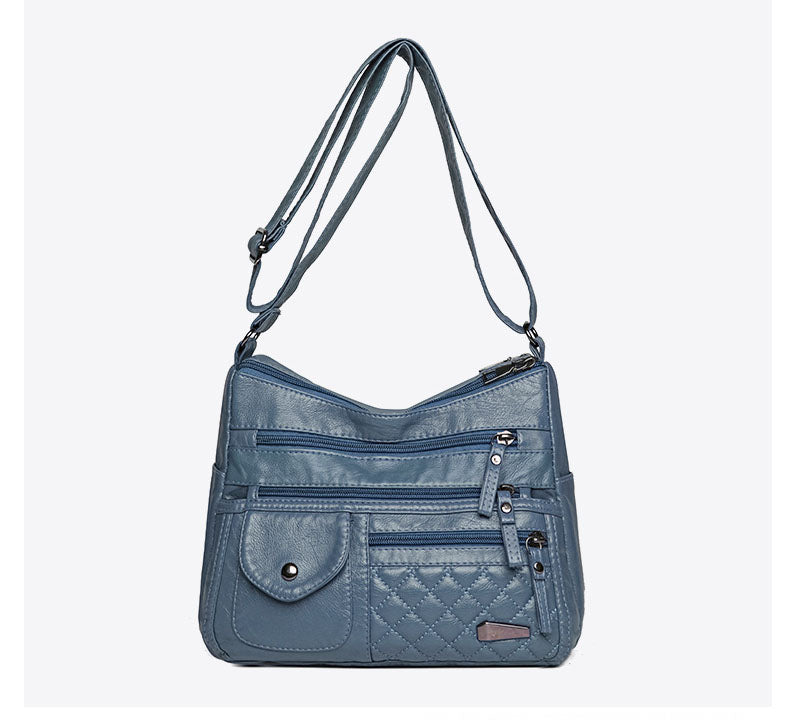 🔥【50% de descuento】Bolso de cuero suave de gran capacidad y múltiples capas para mujer