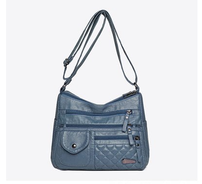 🔥【50% de descuento】Bolso de cuero suave de gran capacidad y múltiples capas para mujer
