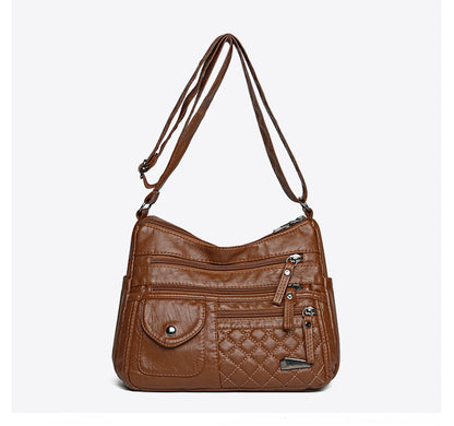 🔥【50% de descuento】Bolso de cuero suave de gran capacidad y múltiples capas para mujer