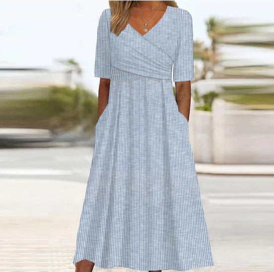 【S-3XL】👗2026 Nova poletna obleka z V-izrezom in žepi, moden cvetlični potisk