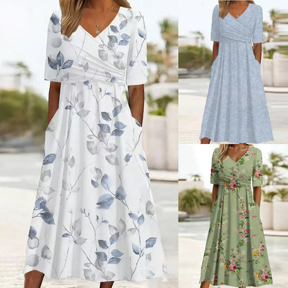 【S-3XL】👗2026 Nova poletna obleka z V-izrezom in žepi, moden cvetlični potisk