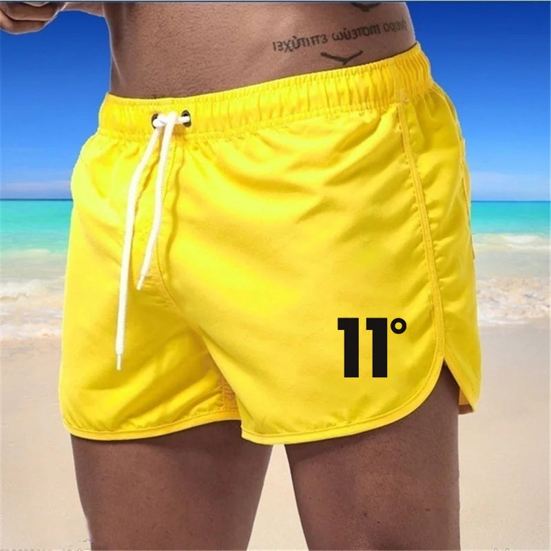 🏖️👖Módní pánské plavecké šortky s vícebarevným potiskem 2026